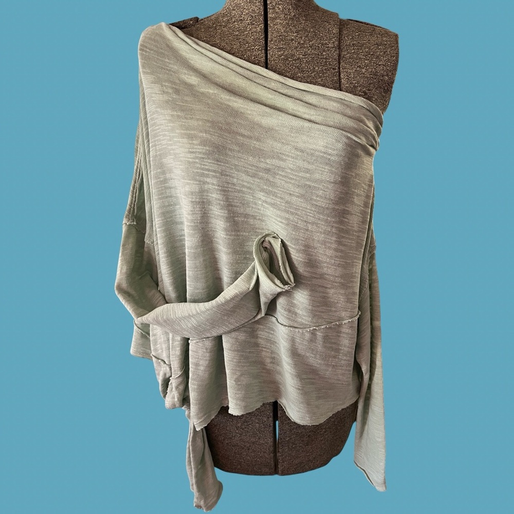 We The Free by Free People asymmetrical top.  Size small.